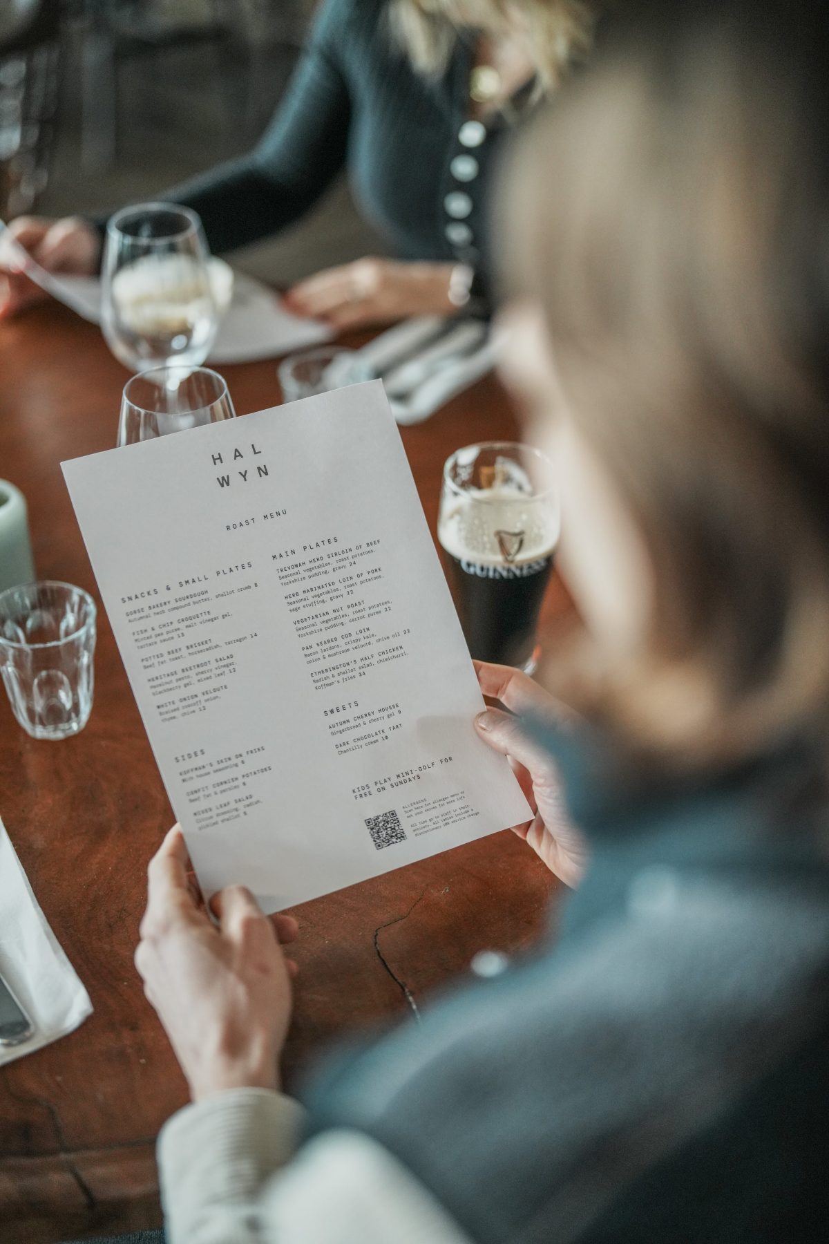 Person reading menu