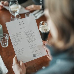 Person reading menu