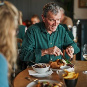 Couple eating Sunday Lunch