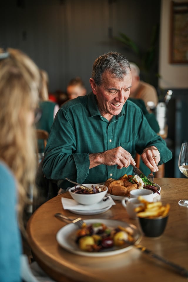 Couple eating Sunday Lunch