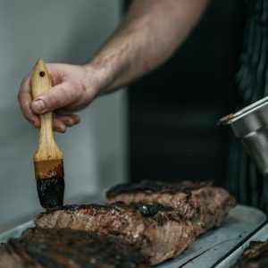 Steak being marinated