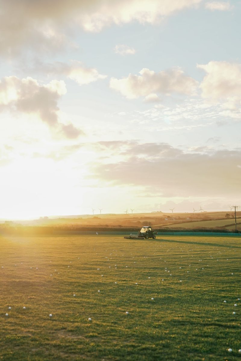 Golf buggy on driving range