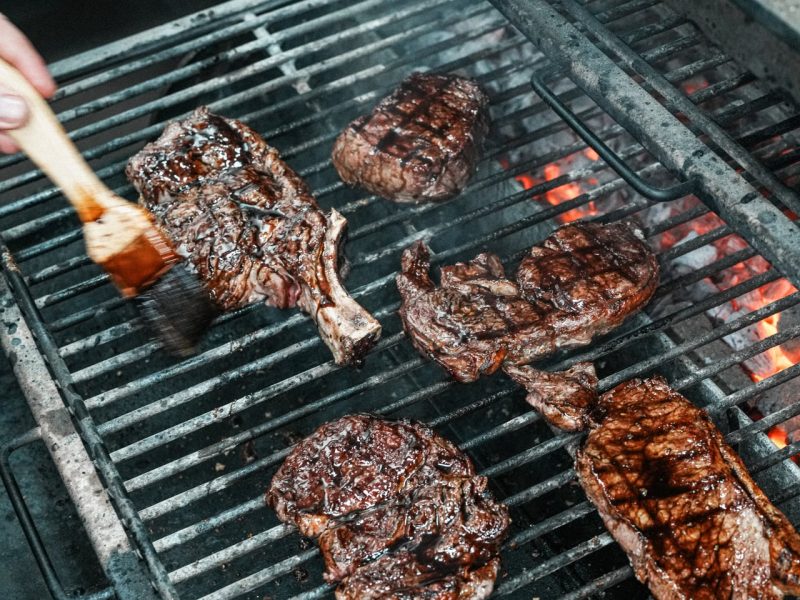 steaks on grill