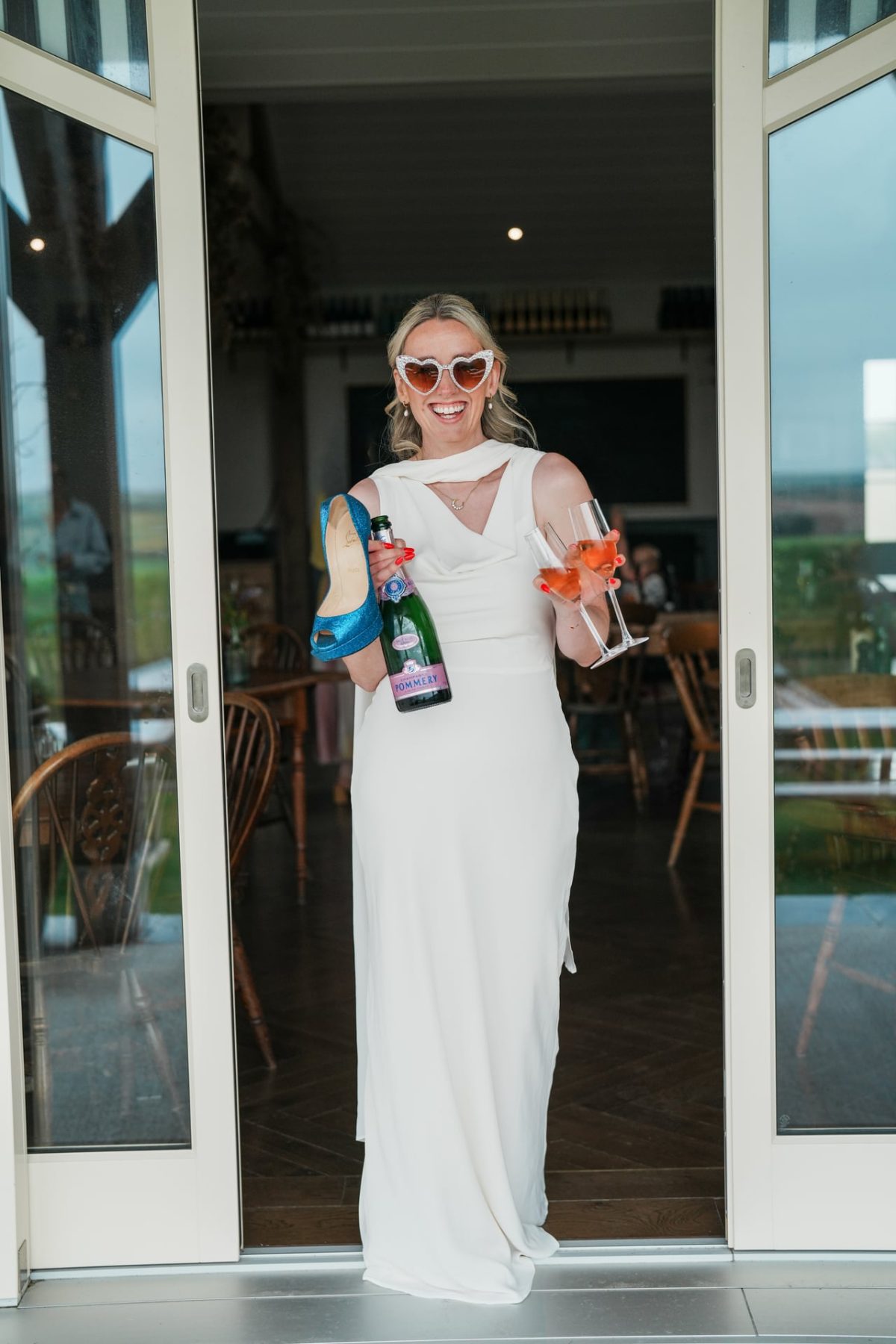 Bride coming out of door