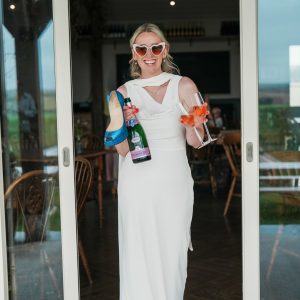 Bride coming out of door