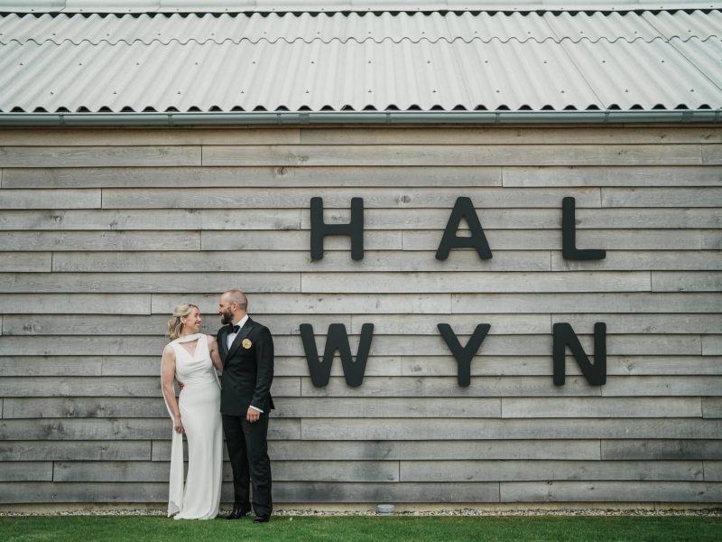 Two people stood outside the barn