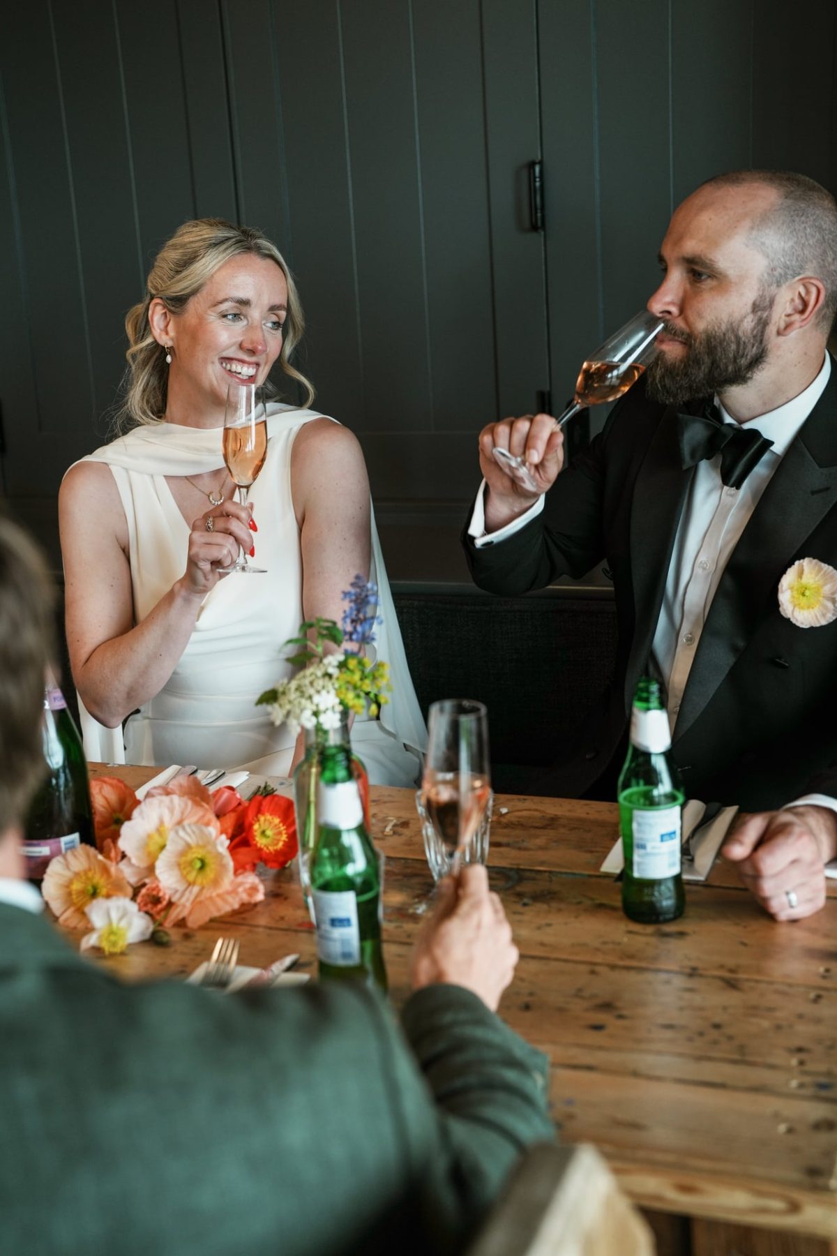 Bride and groom toasting